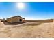 Large backyard with block wall and sand at 1306 E Cecil Ct, Casa Grande, AZ 85122