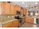 Spacious kitchen with granite countertops and wood cabinets at 1306 E Cecil Ct, Casa Grande, AZ 85122