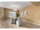 Elegant dining room with a chandelier and neutral decor at 13332 W Palo Verde Dr, Litchfield Park, AZ 85340