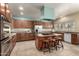 Spacious kitchen featuring an island, stainless steel appliances, and ample cabinetry at 13332 W Palo Verde Dr, Litchfield Park, AZ 85340