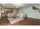 Bright living room with hardwood floors and light walls at 13332 W Palo Verde Dr, Litchfield Park, AZ 85340