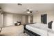 Bright and airy main bedroom with plenty of space for furniture and seating at 13332 W Palo Verde Dr, Litchfield Park, AZ 85340