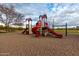 Modern playground with slides and climbing structures at 13332 W Palo Verde Dr, Litchfield Park, AZ 85340