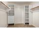 Large walk-in closet with ample shelving and hanging space at 13332 W Palo Verde Dr, Litchfield Park, AZ 85340