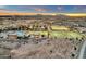 Aerial view of community with tennis courts and pool at 1520 W Sonoqui Blvd, San Tan Valley, AZ 85140