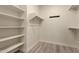 Spacious walk-in closet with ample shelving and hanging space at 1520 W Sonoqui Blvd, San Tan Valley, AZ 85140