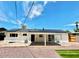 House features a covered patio, solar panels, and a spacious backyard at 1539 E 3Rd St, Mesa, AZ 85203