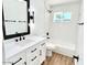 Updated bathroom with white subway tile, a modern vanity, and new fixtures at 1539 E 3Rd St, Mesa, AZ 85203