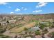 Stunning aerial view showcasing the neighborhood and golf course at 15522 E Cactus Dr, Fountain Hills, AZ 85268