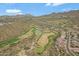 Aerial view of a golf course community with desert landscape at 15522 E Cactus Dr, Fountain Hills, AZ 85268