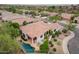 Aerial view of the house, pool, and neighborhood at 15522 E Cactus Dr, Fountain Hills, AZ 85268