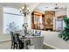 Bright dining room with a fireplace and large windows at 15522 E Cactus Dr, Fountain Hills, AZ 85268