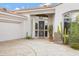 Front entry with security door and cacti at 15522 E Cactus Dr, Fountain Hills, AZ 85268