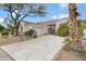 Single-story home with desert landscaping and a paved driveway at 15522 E Cactus Dr, Fountain Hills, AZ 85268