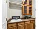 Laundry room with sink, cabinets, and shelving at 15522 E Cactus Dr, Fountain Hills, AZ 85268