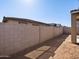 Backyard with a block wall at 16029 W Desert Hollow Dr, Surprise, AZ 85387