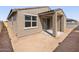 Exterior back of home and patio area at 16029 W Desert Hollow Dr, Surprise, AZ 85387