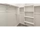 Walk-in closet with ample shelving and hanging space at 16029 W Desert Hollow Dr, Surprise, AZ 85387