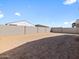 Large backyard with block wall. Ready for landscaping and your personal touch at 16074 W Prickly Pear Trl, Surprise, AZ 85387