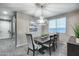 Bright dining room featuring a wooden table and chandelier at 17152 W Grant St, Goodyear, AZ 85338