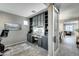 Home office with built-in shelving and desk at 17152 W Grant St, Goodyear, AZ 85338