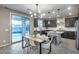 Modern kitchen with island and stainless steel appliances at 17152 W Grant St, Goodyear, AZ 85338