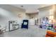 Spacious ' play area with toys, comfy chair, and a view of the upper level at 17152 W Grant St, Goodyear, AZ 85338