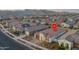 Single-story home with red tile roof in a community at 19930 W Exeter Blvd, Litchfield Park, AZ 85340