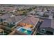 Aerial view of house with pool and landscaped backyard in a residential neighborhood at 19930 W Exeter Blvd, Litchfield Park, AZ 85340