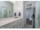 Modern bathroom with white vanity and walk-in shower at 19930 W Exeter Blvd, Litchfield Park, AZ 85340