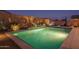 Spacious rectangular pool with lighting and landscaping at 19930 W Exeter Blvd, Litchfield Park, AZ 85340