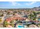 Aerial view of a home with pool and surrounding landscape at 215 E Marconi Ave, Phoenix, AZ 85022