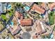 Bird's-eye view of a neighborhood with a focus on one home and pool at 215 E Marconi Ave, Phoenix, AZ 85022