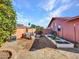 Backyard with raised garden beds and fruit trees at 215 E Marconi Ave, Phoenix, AZ 85022