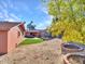 Artificial turf backyard with a view of the house at 215 E Marconi Ave, Phoenix, AZ 85022