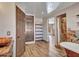 Main bathroom with a view into another room at 215 E Marconi Ave, Phoenix, AZ 85022