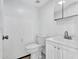 Clean and simple bathroom with a white vanity at 215 E Marconi Ave, Phoenix, AZ 85022