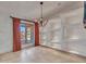 Bright dining room with built-in shelves and window at 215 E Marconi Ave, Phoenix, AZ 85022