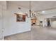 Dining room with a chandelier and fireplace views at 215 E Marconi Ave, Phoenix, AZ 85022