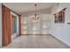 Dining room featuring built-in shelving and a chandelier at 215 E Marconi Ave, Phoenix, AZ 85022