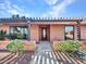 House exterior featuring a pergola and brick facade at 215 E Marconi Ave, Phoenix, AZ 85022