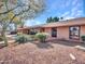 Brick ranch house with a covered entryway and landscaped yard at 215 E Marconi Ave, Phoenix, AZ 85022