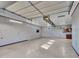 Large garage featuring high ceilings and a kitchenette at 215 E Marconi Ave, Phoenix, AZ 85022