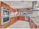 Modern kitchen with granite countertops and stainless steel appliances at 215 E Marconi Ave, Phoenix, AZ 85022