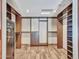 Large walk-in closet with ample shelving and a safe at 215 E Marconi Ave, Phoenix, AZ 85022