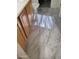 Bathroom featuring wood cabinets and marble-look floors at 30084 N Desert Willow Blvd, San Tan Valley, AZ 85143