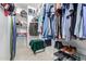 Well-organized closet with hanging rods and shoe storage at 30084 N Desert Willow Blvd, San Tan Valley, AZ 85143