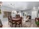 Dining room with hardwood floors, a chandelier, and a traditional table at 30084 N Desert Willow Blvd, San Tan Valley, AZ 85143