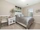 Cozy bedroom with a full-size bed and neutral decor at 3039 W Sand Flower Dr, Phoenix, AZ 85086