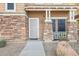 Inviting front entrance with stone details and a security door at 3039 W Sand Flower Dr, Phoenix, AZ 85086